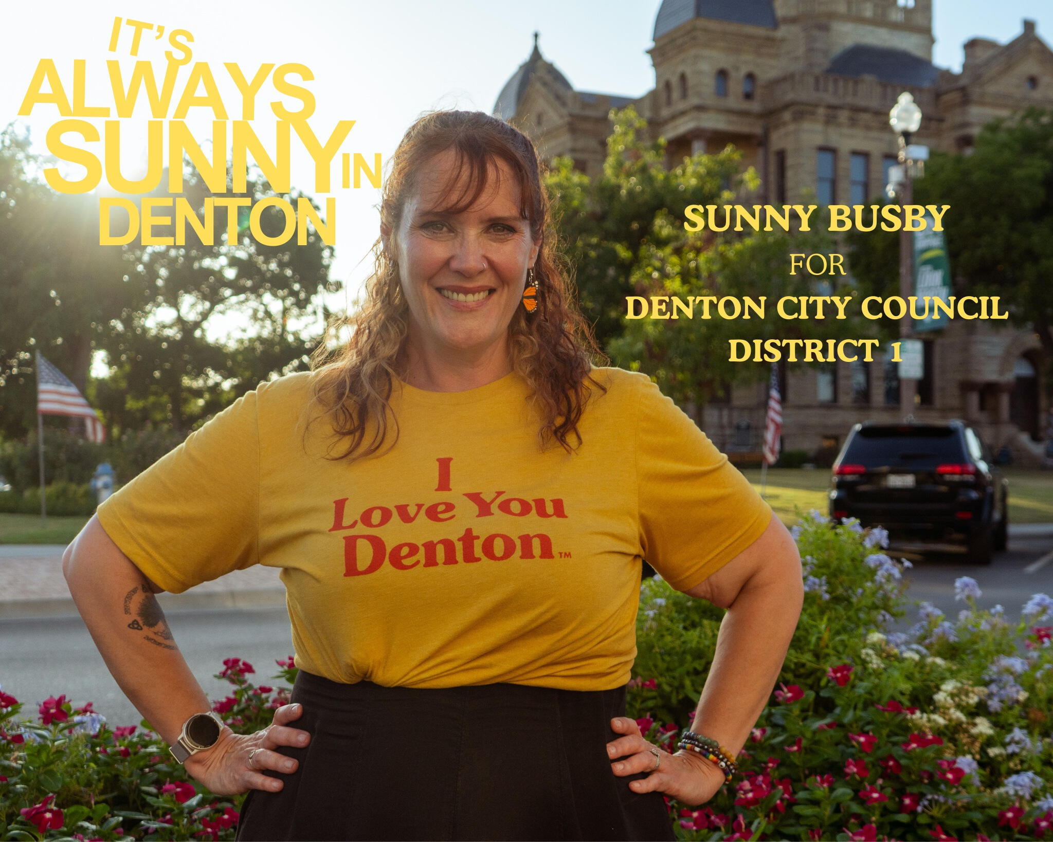 Sunny on the Square Sunny on the Denton Square wearing a shirt reading "I Love You Denton"